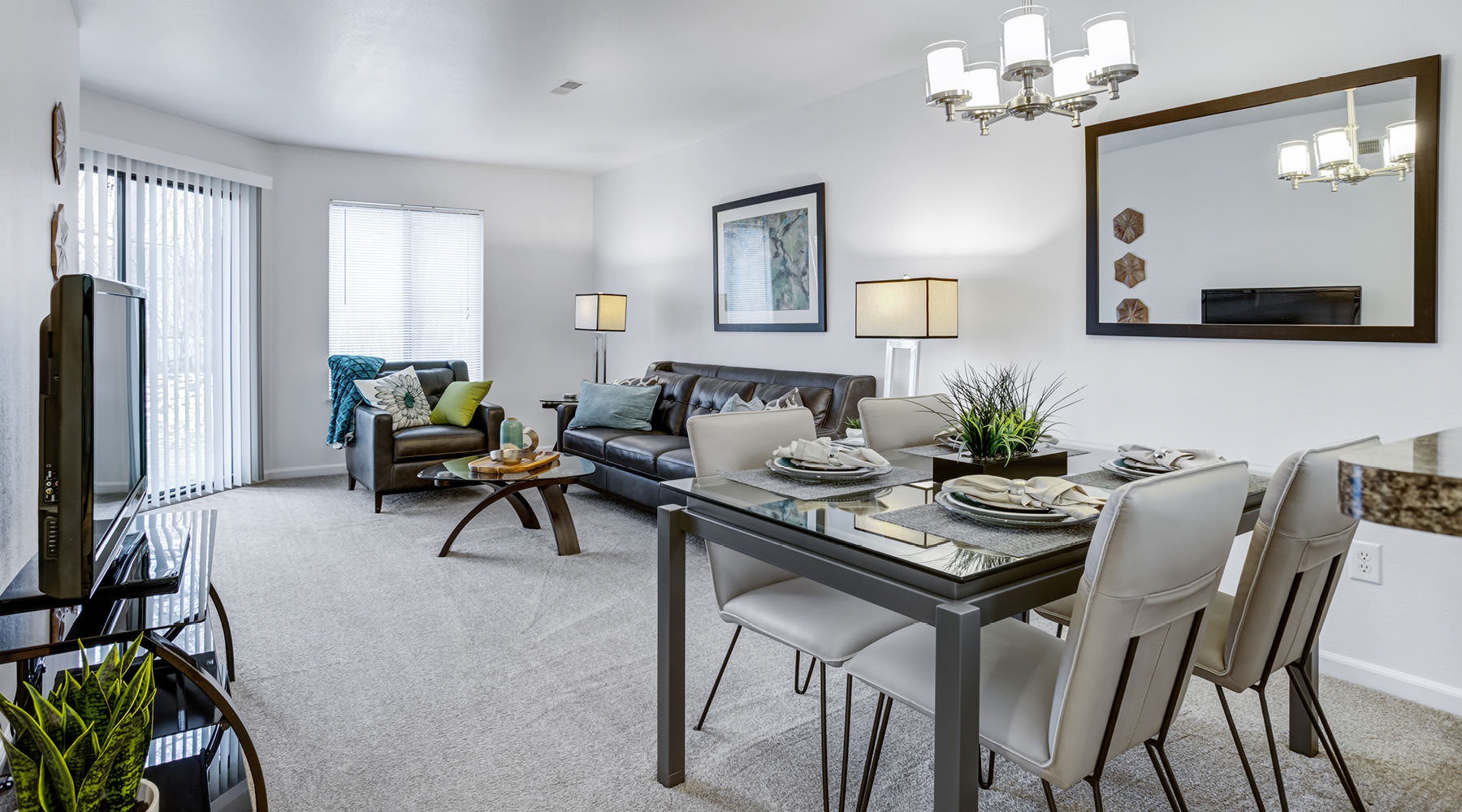 spacious living room open to dining area